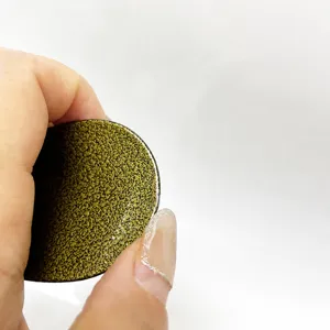 Portable stainless steel shoe horn with unique textured finish, durable metal shoe helper tool.