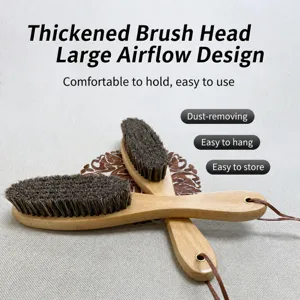 Wooden handle horsehair brush for shoe polishing, dust removal, and furniture cleaning.