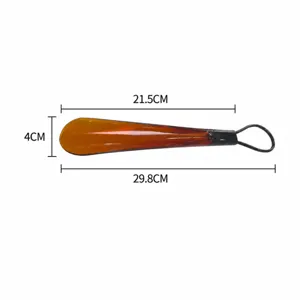 Tragbarer Schuhlöffel aus Kunststoff mit Aufhängeschlaufe für den täglichen Gebrauch zu Hause.