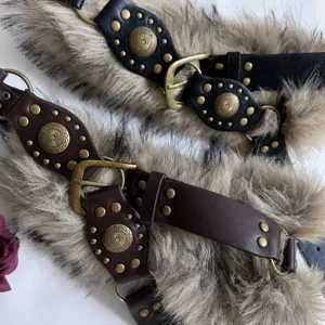 Vintage wasteland style plush rivet spliced belt detail showing faux fur and metal hardware.