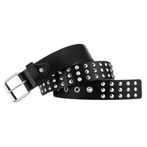 Close-up of black leather punk rivet belt showing detailed metal studs and silver buckle.