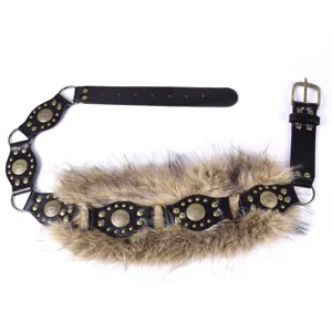 Close-up detail of retro wasteland style waist belt featuring plush fur and metal rivets.