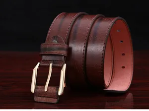 Detailed view of brown men dress belt with golden pin buckle soft leather casual design
