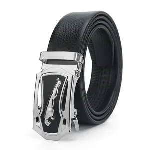 Close-up of the silver automatic metal buckle with leaping cat emblem on black leather.