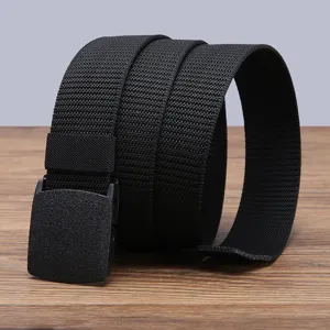 Detail shot of a black tactical nylon belt rolled up on wood table for outdoor sports.
