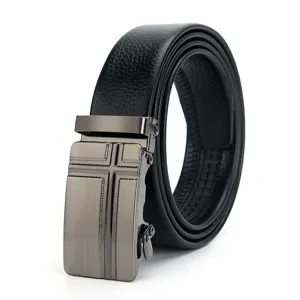 Close-up detail of the stylish black leather men's belt featuring a sleek metallic automatic buckle.