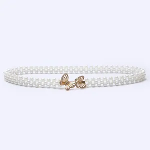 Elegant pearl waist chain with rhinestone butterfly buckle for women dress sweater decoration.