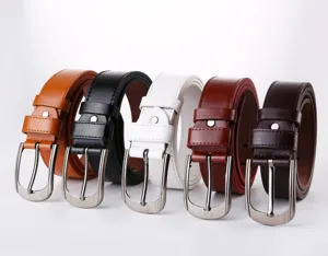 Close-up detail of multi-color men leather belts with classic metal pin buckles stylish.