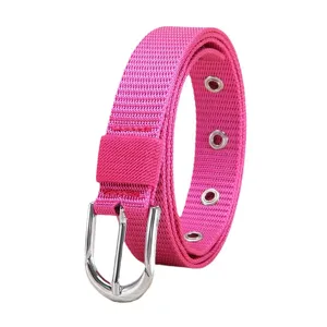 Pink canvas belt for women, casual woven nylon strap with silver buckle and metal eyelets.