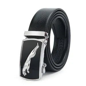 Close-up of men's leather belt buckle featuring a metallic leaping cat logo on black.