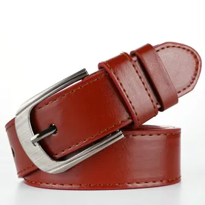 Detailed view of brown men leather belt with metal pin buckle classic casual design