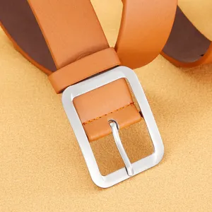 Detailed view of men's brown PU leather belt with silver pin buckle, showing fine stitching.