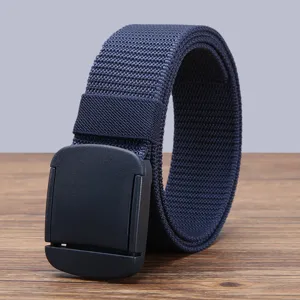 Detailed view of a dark blue nylon canvas belt with black plastic buckle for daily use.