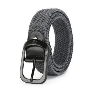 Detail view of a dark grey woven elastic belt featuring black metal buckle and stretch fabric.