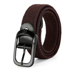 Detailed view of the dark brown woven elastic canvas belt with a sleek black metal buckle.