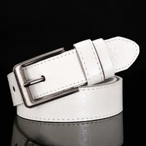 Close up view of white synthetic leather belt strap with embossed portrait pattern details.
