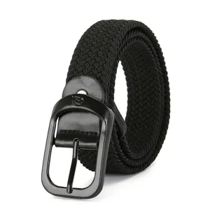 Black woven elastic belt detail showing the stylish metal buckle and textured strap.