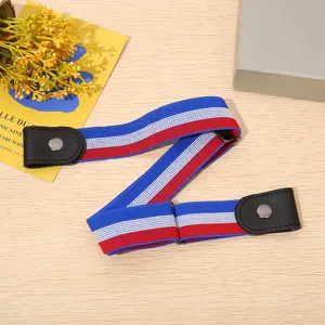 Detailed shot of elastic buckle-free stretch belt in red white blue with leather snap buttons.