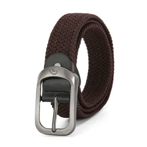 Brown braided elastic belt detail, woven canvas strap with durable metal buckle and leather.