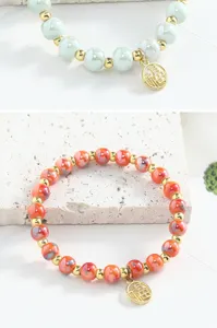 Bracelet en perles de céramique de Jingdezhen avec espaceurs en métal et pendentif porte-bonheur
