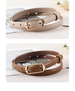 Detailed view of women thin leather belt with metal square buckle casual daily wear.