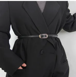 Minimalist black thin leather belt with metal buckle, perfect waist accessory for blazer.