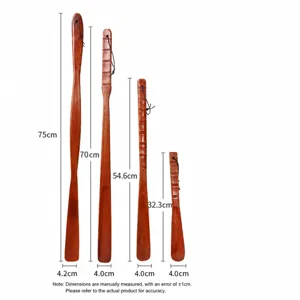 Long wooden shoe horn size chart showing various lengths for comfortable daily footwear use.