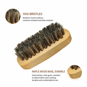 Wooden shoe cleaning brush with natural pig hair bristles and durable handle for daily care.