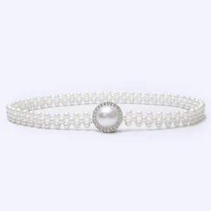 Elegant women's pearl waist belt with rhinestone buckle, perfect for dresses and sweaters.
