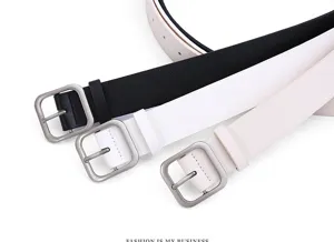 Detail shot of women's PU leather belt with classic square metal buckle, clean black white beige.