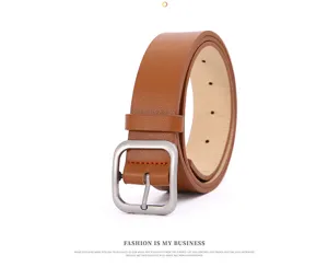 Brown PU leather belt detail showing square metal buckle and minimalist jeans style.