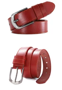 Detailed view of red leather men belt with silver buckle and contrast stitching close-up.