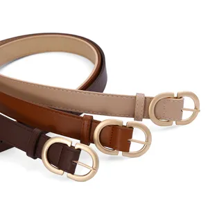 Women thin leather belt set with gold metal buckle, stylish casual waist strap for jeans.