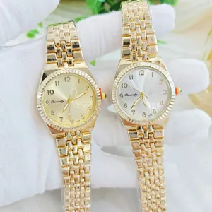 Elegante Damen Gold Stahlarmband Quarzuhren, klassisches rundes Zifferblatt Accessoire.