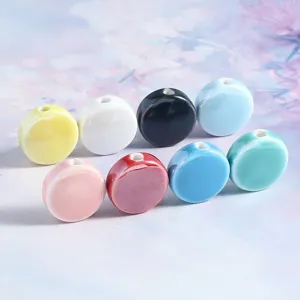 Colorful ceramic flat beads for DIY jewelry making, bracelet accessories and handmade crafts.