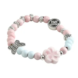 Braccialetto di perle in ceramica stile cinese con perline rosa blu, ciondoli farfalla fiore.