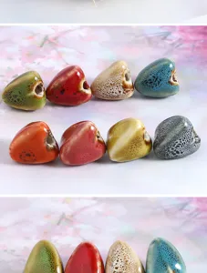 Ceramic bead detail showing unique kiln glaze texture, perfect for DIY jewelry crafting.
