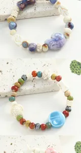 Handmade ceramic bead bracelet featuring cute conch and turtle charms for women chic daily wear.