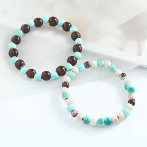 Bracelet de perles en ceramique, style artistique frais multicolore bijoux pour femmes.