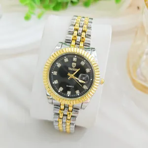 Luxe tweekleurig quartz horloge voor heren en dames met strass wijzerplaat en datum.
