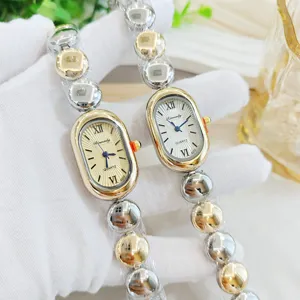 Vintage ovale Damen-Quarzuhr mit Metallperlen-Armband, modische Luxus-Uhr für Frauen.