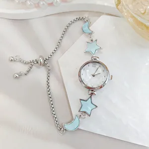 Women silver quartz watch star moon charm bracelet style elegant daily wear student timepiece