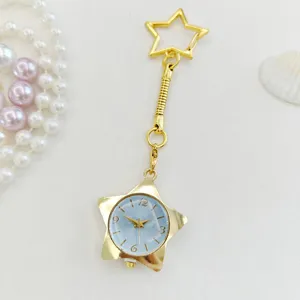 Gold star pocket watch keychain with blue dial, stylish nurse watch for women and girls daily use.