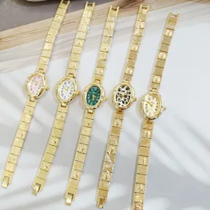 Montre quartz vintage pour femme avec cadran ovale strass et bracelet métallique, 5 coloris.
