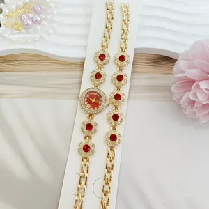 Ensemble montre et bracelet pour femme or avec strass rouges, accessoire de bijoux floraux.