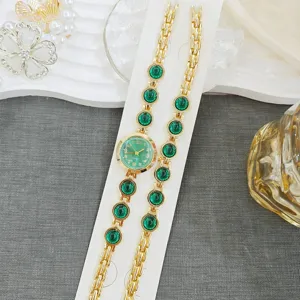Chryso roloi quartz gynaikas se chryso tono me prasino litho kai set, kompsos moda.