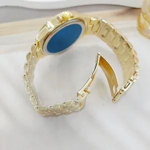 Detailed view of a gold stainless steel watch strap and clasp with protective film.