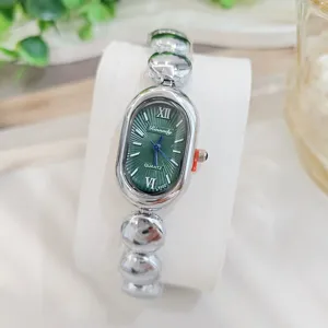 Vintage grunes Zifferblatt ovale Quarz Damenwatch mit stilvollem Metall Bohnenketten Armband.