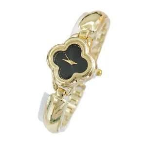 Elegant gold women's watch with black clover dial luxury fashion bracelet timepiece