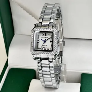 Luxury women square diamond quartz watch with roman numerals and stainless steel strap.